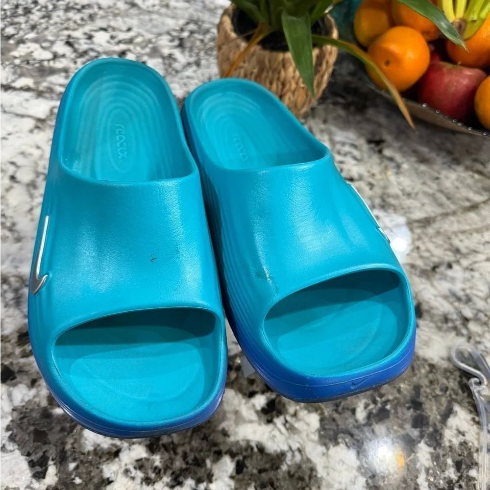 Nike reactx slides